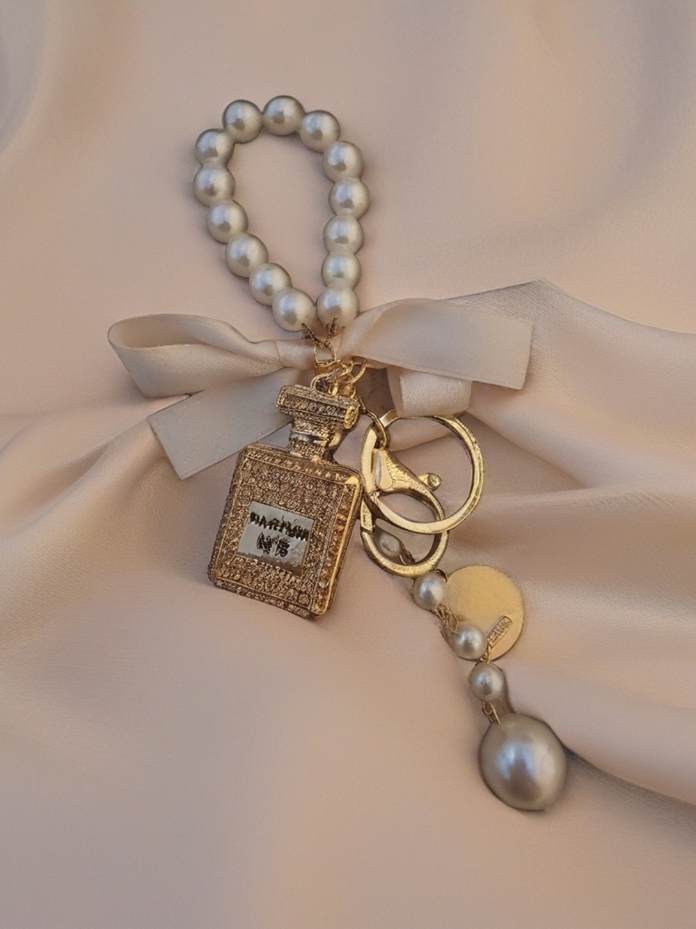 Pearl Beaded Gold Perfume Bottle Keyring with Cream Ribbon